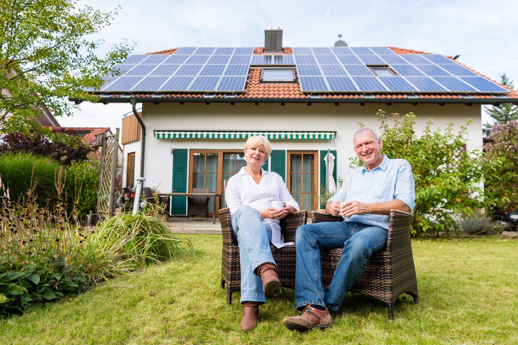 Image of homeowners and solar panels